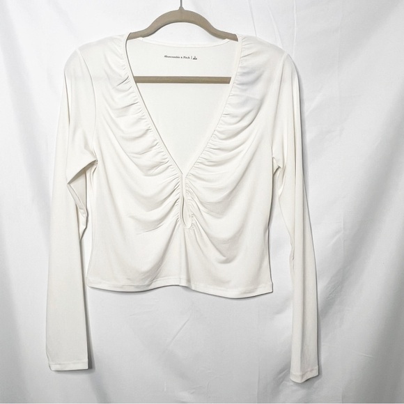 Abercrombie & Fitch Tops - NEW with tags Abercrombie and Fitch Plunge Neckline Long Sleeve Top